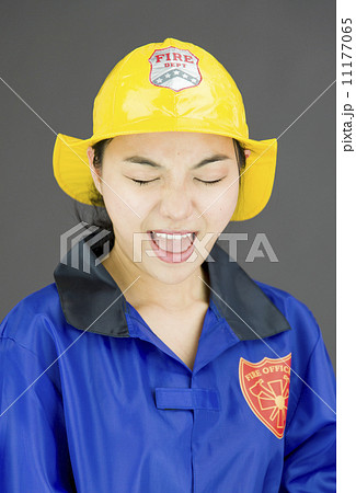 Close up of a lady firefighter shouting Close up of a lady firefighter shouting 11177065