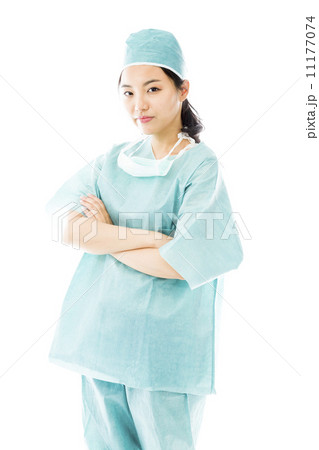 Confident Asian female surgeon standing with arms crossed Confident Asian female surgeon standing with arms crossed 11177074