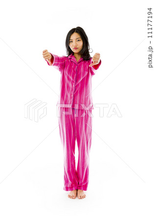 Young Asian woman showing thumbs down sign from both hands Young Asian woman showing thumbs down sign from both hands 11177194