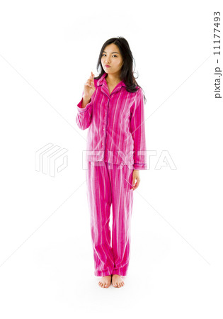 Young Asian woman standing with finger crossed 11177493