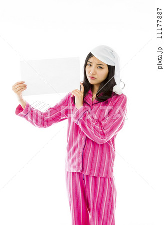 Sad Asian young woman holding a blank placard 11177887