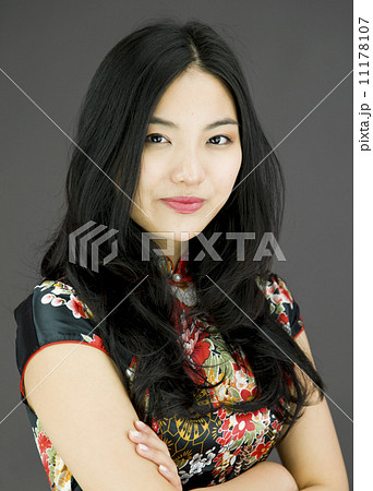 Confident Asian young woman with arms crossed 11178107