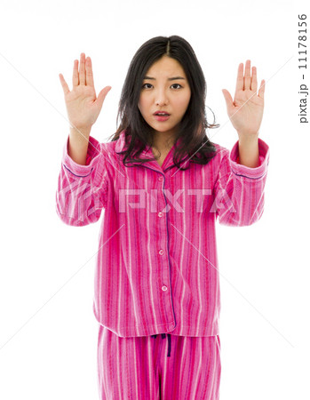 Young Asian woman making stop gesture sign from both hands Young Asian woman making stop gesture sign from both hands 11178156