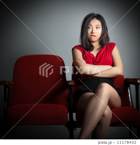 Attractive Asian girl 20s at the theatre isolate white backgroun Attractive Asian girl 20s at the theatre isolate white backgroun 11178432