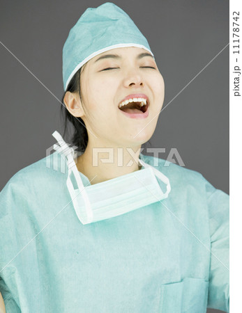 Asian female surgeon celebrating success 11178742