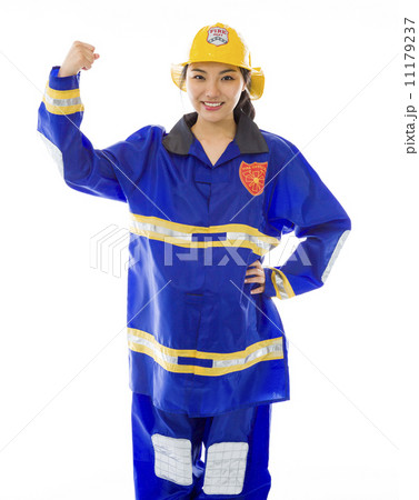 Lady firefighter showing flexing biceps 11179237
