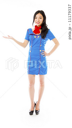 Asian happy air stewardess presenting isolated on white background Asian happy air stewardess presenting isolated on white background 11179337