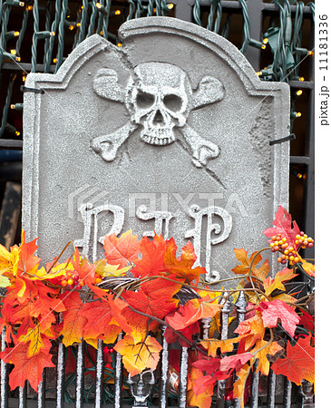 Statue of gravestone at a window basket Statue of gravestone at a window basket 11181336