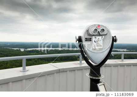 Coin operated binoculars with forest in the background, Saint La 11183069