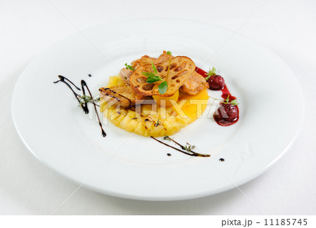 Quail breast with polenta, apple chutney and cherry-cognac sauce 11185745