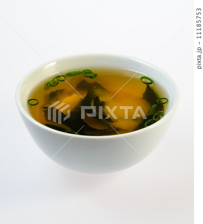 Bowl of fish soup over white background Bowl of fish soup over white background 11185753