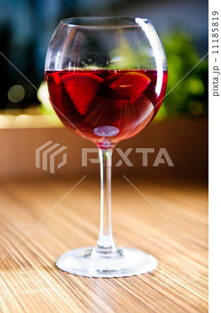 Glass of red wine with fruits Glass of red wine with fruits 11185819