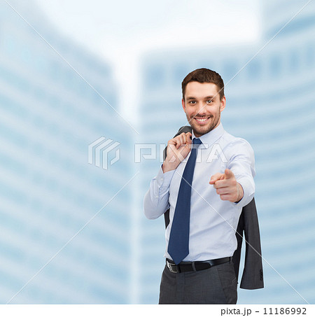 handsome buisnessman with jacket over shoulder handsome buisnessman with jacket over shoulder 11186992