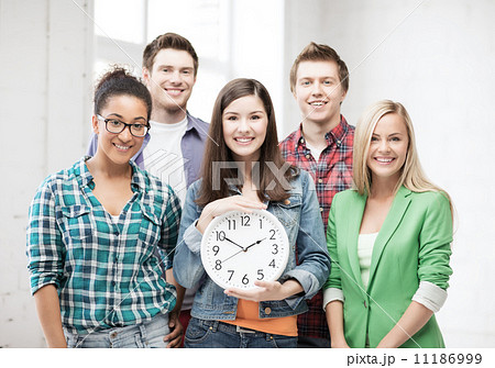 group of students at school with clock 11186999