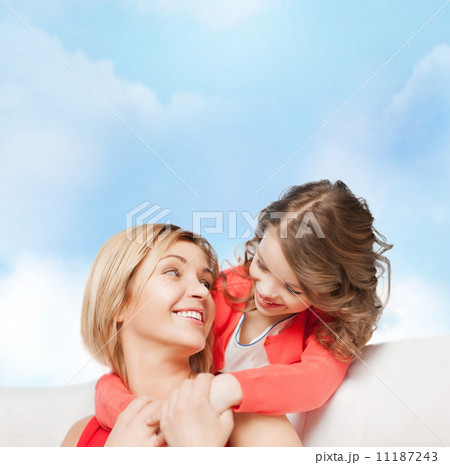 hugging mother and daughter hugging mother and daughter 11187243