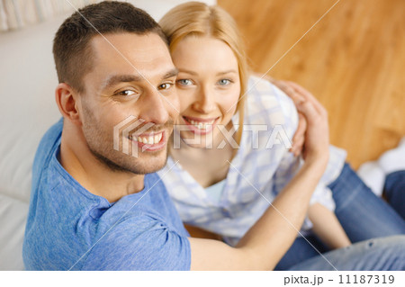 smiling happy couple at home smiling happy couple at home 11187319