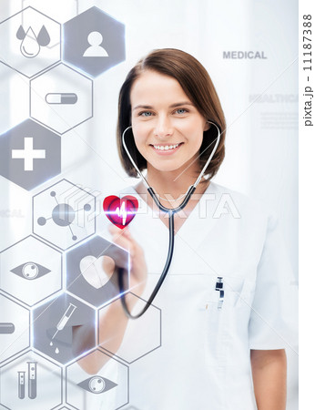female doctor with stethoscope and virtual screen female doctor with stethoscope and virtual screen 11187388
