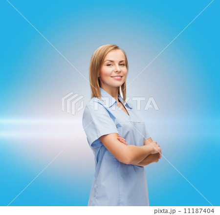 smiling female doctor or nurse 11187404