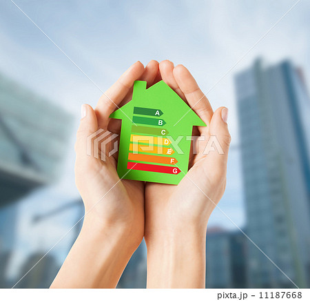 hands holding green paper house hands holding green paper house 11187668