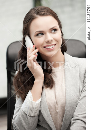 businesswoman with cell phone calling businesswoman with cell phone calling 11187794