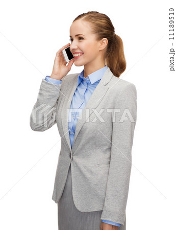 young smiling businesswoman with smartphone 11189519