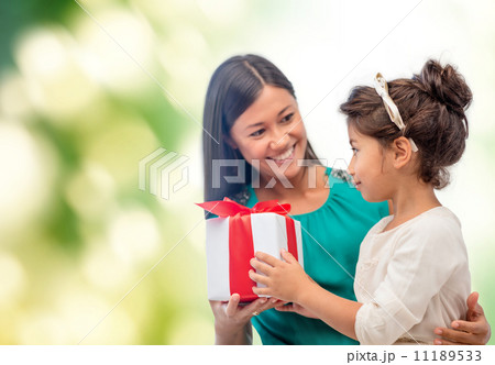 happy mother and child girl with gift box 11189533