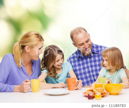 happy family with two kids with having breakfast happy family with two kids with having breakfast 11189783