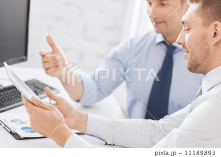 businessmen with notebook and tablet pc businessmen with notebook and tablet pc 11189893