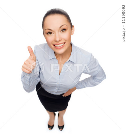 smiling asian businesswoman showing thumbs up smiling asian businesswoman showing thumbs up 11190092