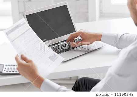 miling businessman working in office miling businessman working in office 11190248
