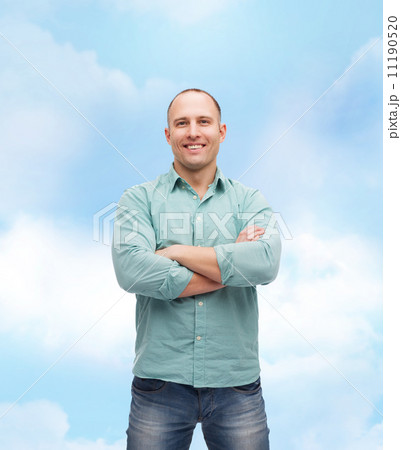 smiling man with crossed arms smiling man with crossed arms 11190520
