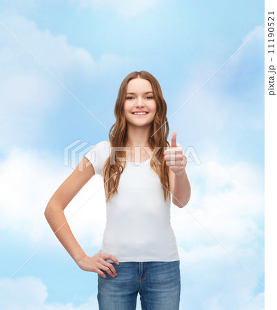 smiling teenager in blank white t-shirt smiling teenager in blank white t-shirt 11190521