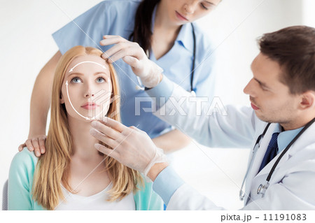 male plastic surgeon with patient male plastic surgeon with patient 11191083
