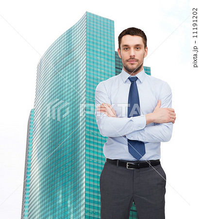 handsome businessman with crossed arms handsome businessman with crossed arms 11191202