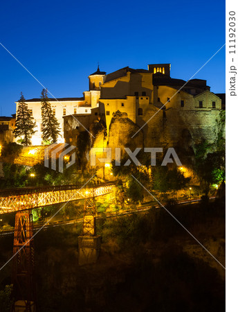 night view of houses on rocks in Cuenca 11192030