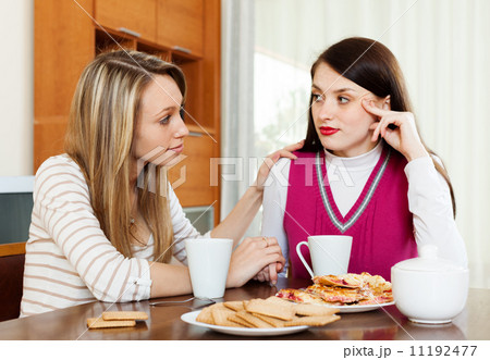 woman consoling the depressed woman woman consoling the depressed woman 11192477