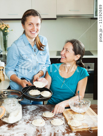 Happy women making pies 11192689