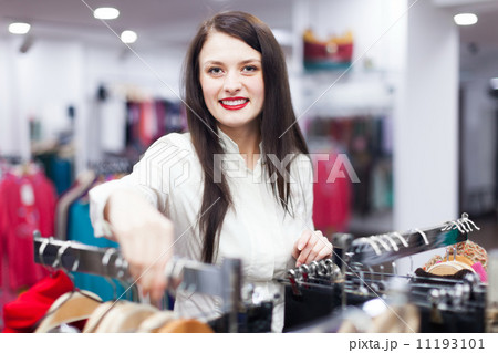 Smiling buyer at clothing store 11193101