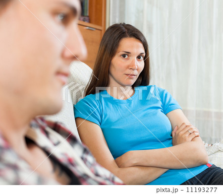 Girl after quarrel in living room at home Girl after quarrel in living room at home 11193277