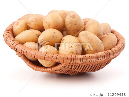 Potato tuber in wicker basket isolated on white background Potato tuber in wicker basket isolated on white background 11209458