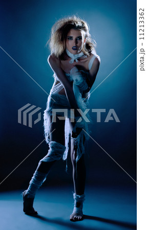 Beautiful slim girl posing dressed as mummy 11213362