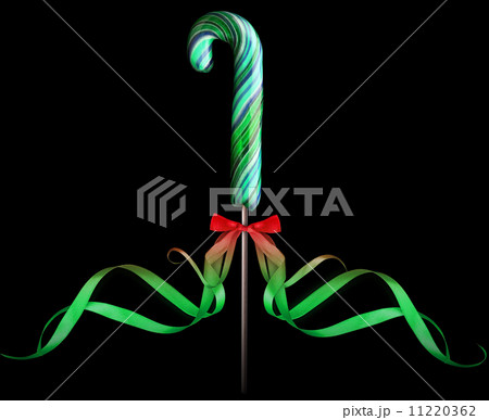 Bright colorful lollipop over black background 11220362