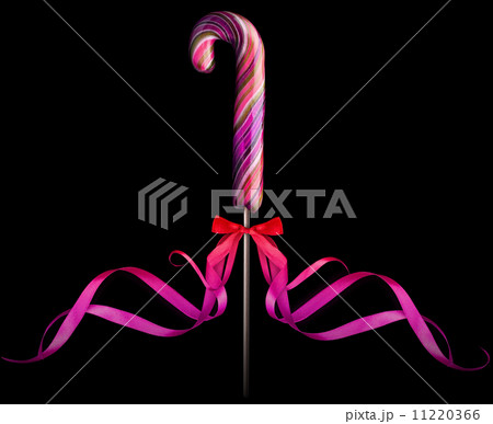 Bright colorful lollipop over black background 11220366