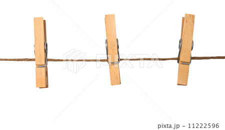 three clothespins on rope 11222596