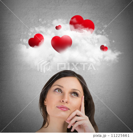 Red hearts flying in cloud overhead of beautiful dreamy woman. V Red hearts flying in cloud overhead of beautiful dreamy woman. V 11225661