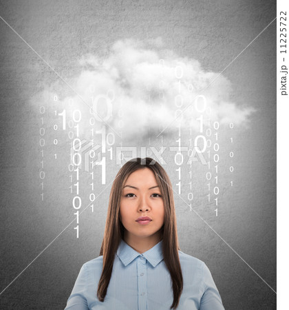 Young business woman or system administrator under cloud with di Young business woman or system administrator under cloud with di 11225722