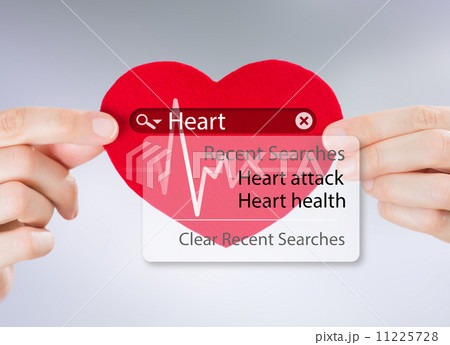Female hands holding heart and heartbeat symbol with search engi Female hands holding heart and heartbeat symbol with search engi 11225728