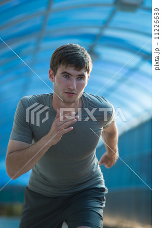 Runner athlete running road city Runner athlete running road city 11226639