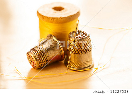 Thread bobbins and sewing thimbles Thread bobbins and sewing thimbles 11227533