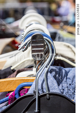 clothes on a rack on a flea market clothes on a rack on a flea market 11228830
